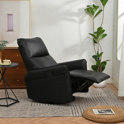 A black modern small swing swivel recliner chair with a side pocket, situated in a room with a light brown carpet, a wooden side table, and a green potted plant in the background.