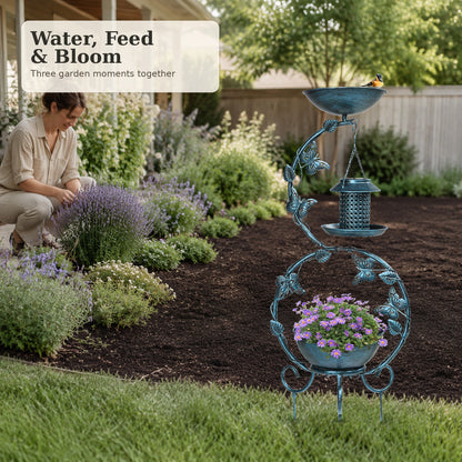Antique Blue bird bath, feeder and planter in a landscaped garden