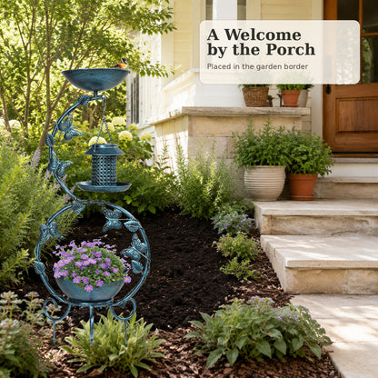 Antique Blue bird bath with feeder and planter beside a porch