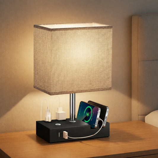 Bedside charging lamp on a warm wood nightstand in a premium bedroom.