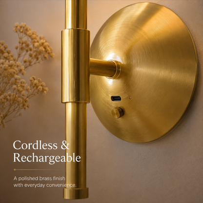 Close-up of cordless rechargeable brass wall sconce construction and controls