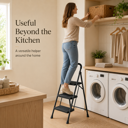 Woman using a matte black three-step folding ladder in a laundry room