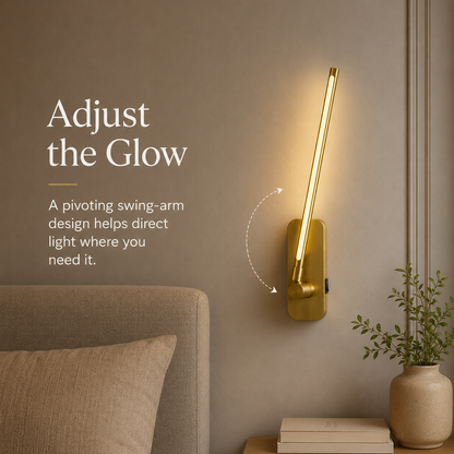 Adjustable gold swing-arm wall sconce directing light beside a bed