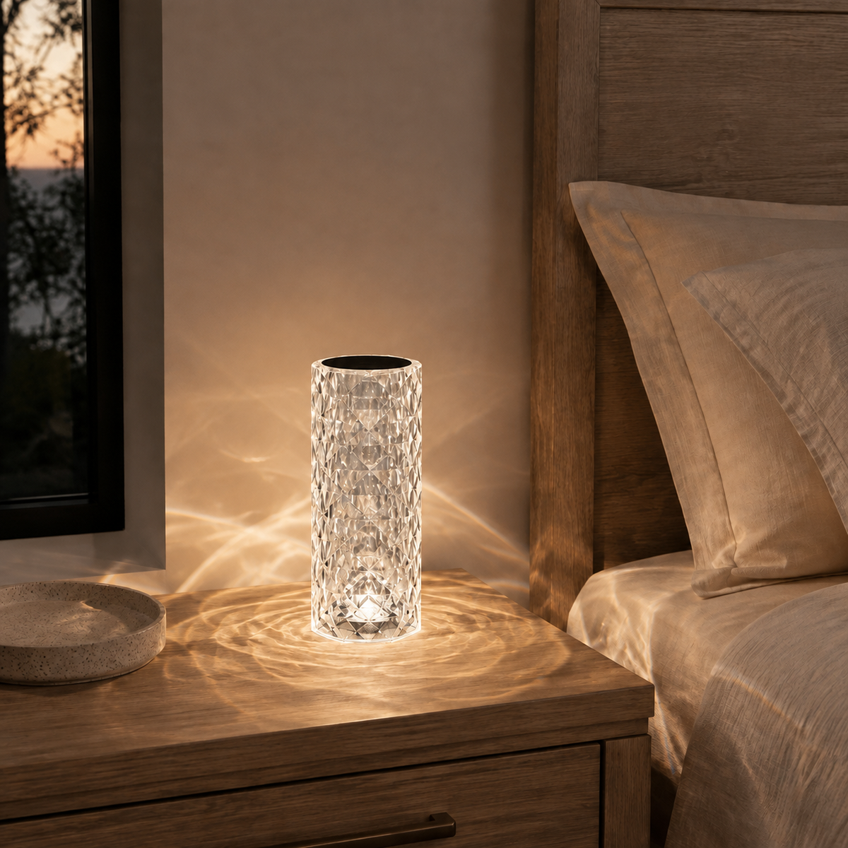 Viva Elite Nordic crystal projector lamp glowing on a warm wood nightstand