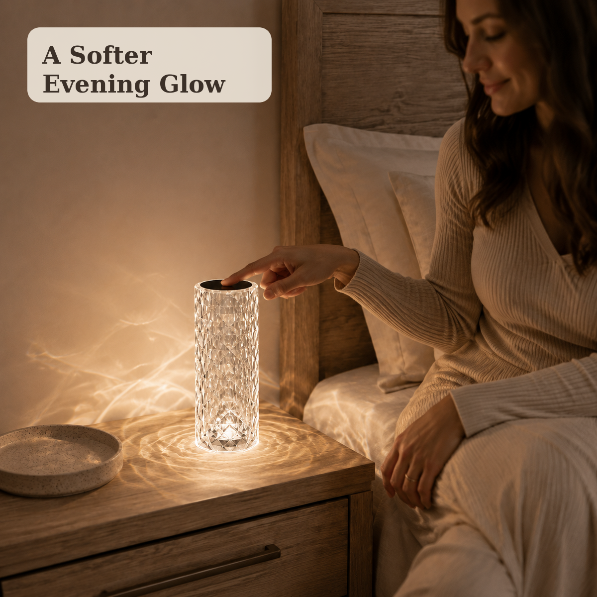 Woman using the touch control on a Viva Elite Nordic crystal projector lamp