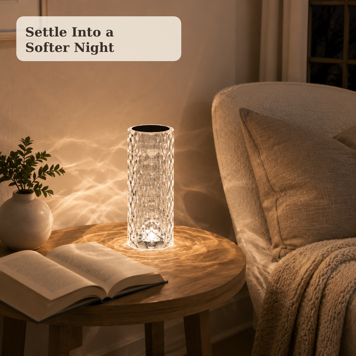 Viva Elite Nordic crystal projector lamp glowing beside a cozy reading chair