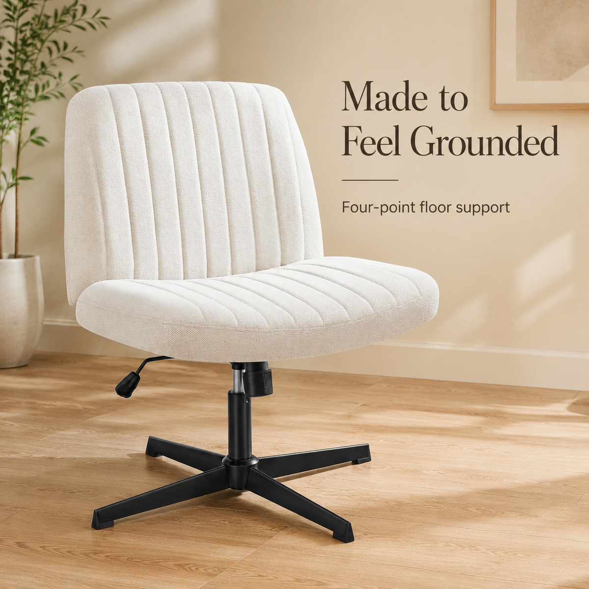White Viva Oslo chair showing the black four-point cross base and floor support