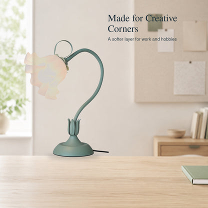 Mint green flower lamp in a bright creative workspace
