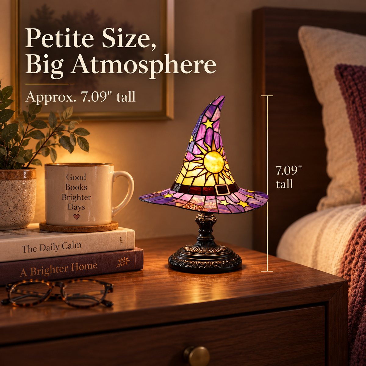 Petite witch hat accent lamp shown at approximately 7.09 inches tall beside books and a mug