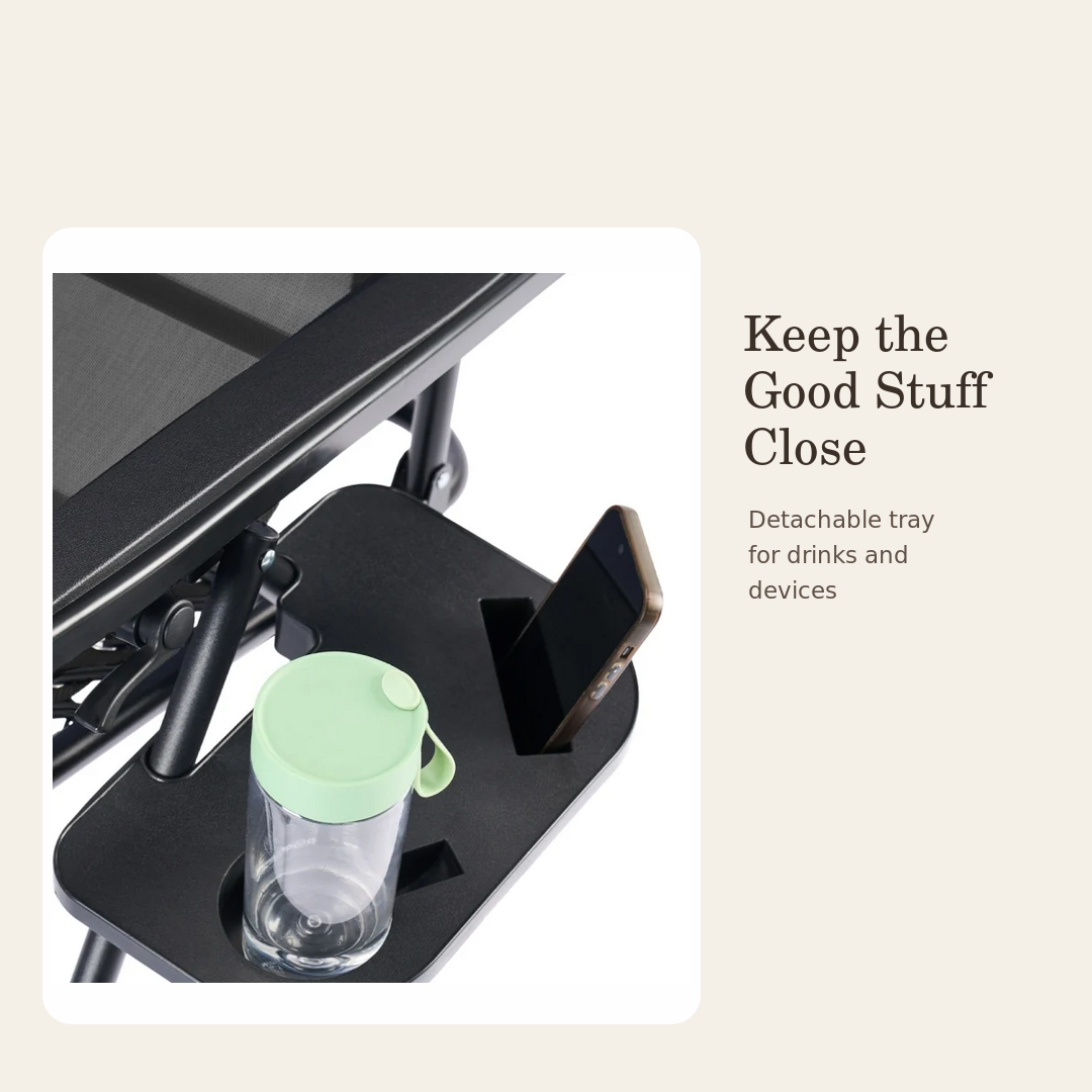 Detachable chair tray holding a drink and phone within easy reach